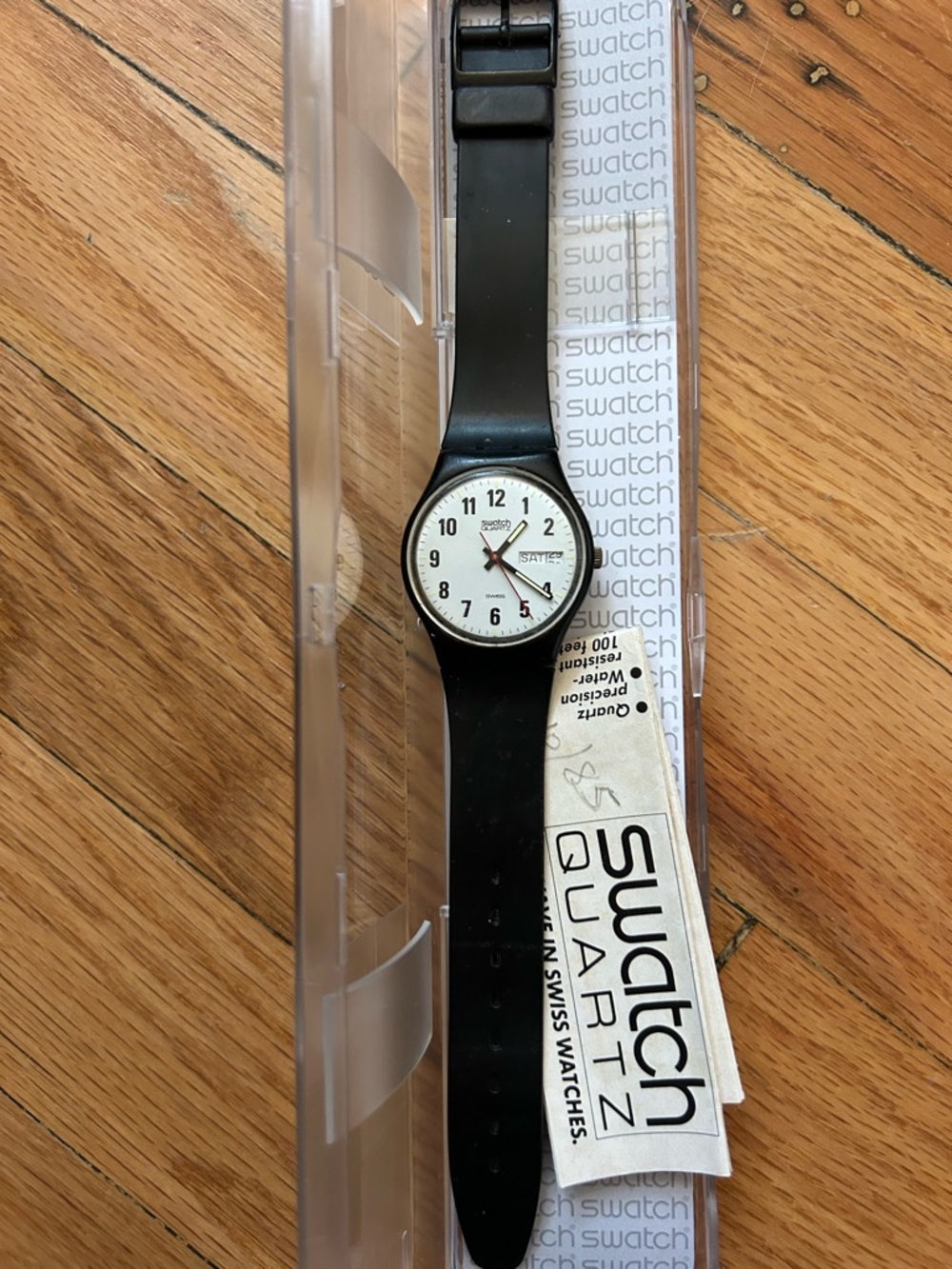 Swatch Black Strap Watch with White Dial